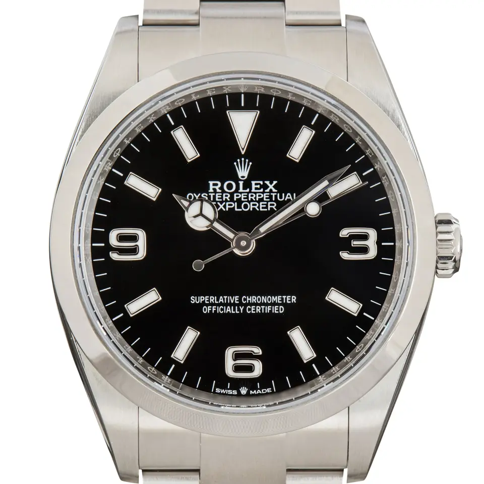 Rolex Explorer 124270 with a black dial, 3, 6 and 9 numerals and a smooth steel bezel, a pre-owned example, studio close-up of the case