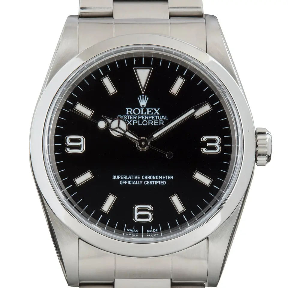 Rolex Explorer 14270 with a black dial with 3, 6 and 9 numerals on a steel Oyster bracelet, a pre-owned example, studio close-up of the case