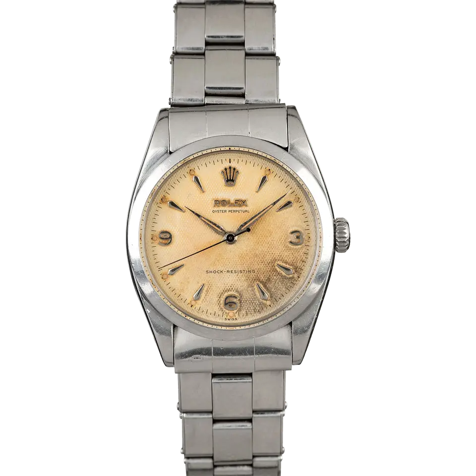 Rolex Explorer 6298 with an aged honeycomb dial with 3, 6 and 9 numerals, smooth steel bezel and steel Oyster bracelet, a pre-owned example, front view of the whole watch