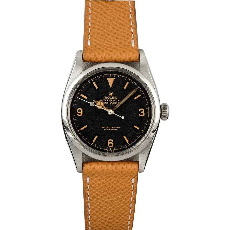 Rolex Explorer 6610 with a black gilt dial with 3, 6 and 9 numerals and a smooth steel bezel on a tan leather strap, a pre-owned example, front view of the whole watch