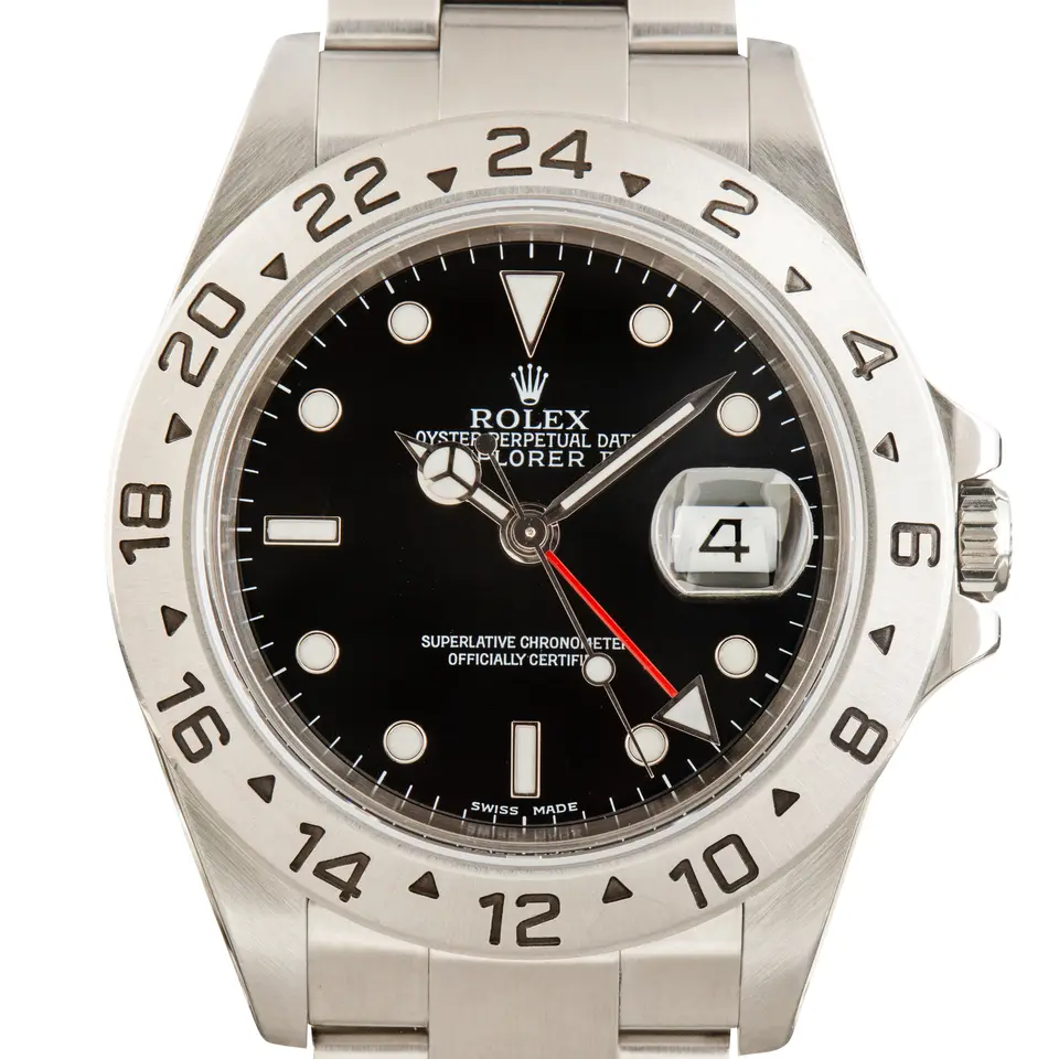 Rolex Explorer II 16570 with a black dial, red 24-hour hand and fixed steel 24-hour bezel on an Oyster bracelet, a pre-owned example, studio close-up of the case