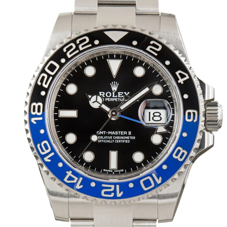 Rolex GMT-Master II 116710BLNR (Batman) with a black dial and blue and black ceramic bezel on a steel Oyster bracelet, a pre-owned example, studio close-up of the case