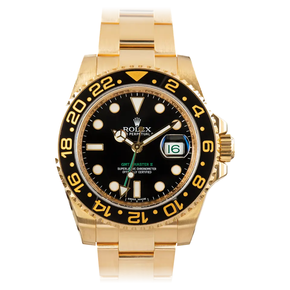 Rolex GMT-Master II 116718LN with a black dial with a green GMT-Master II legend and a black ceramic 24-hour bezel with gold numerals on a yellow gold Oyster bracelet, a pre-owned example, front view of the whole watch