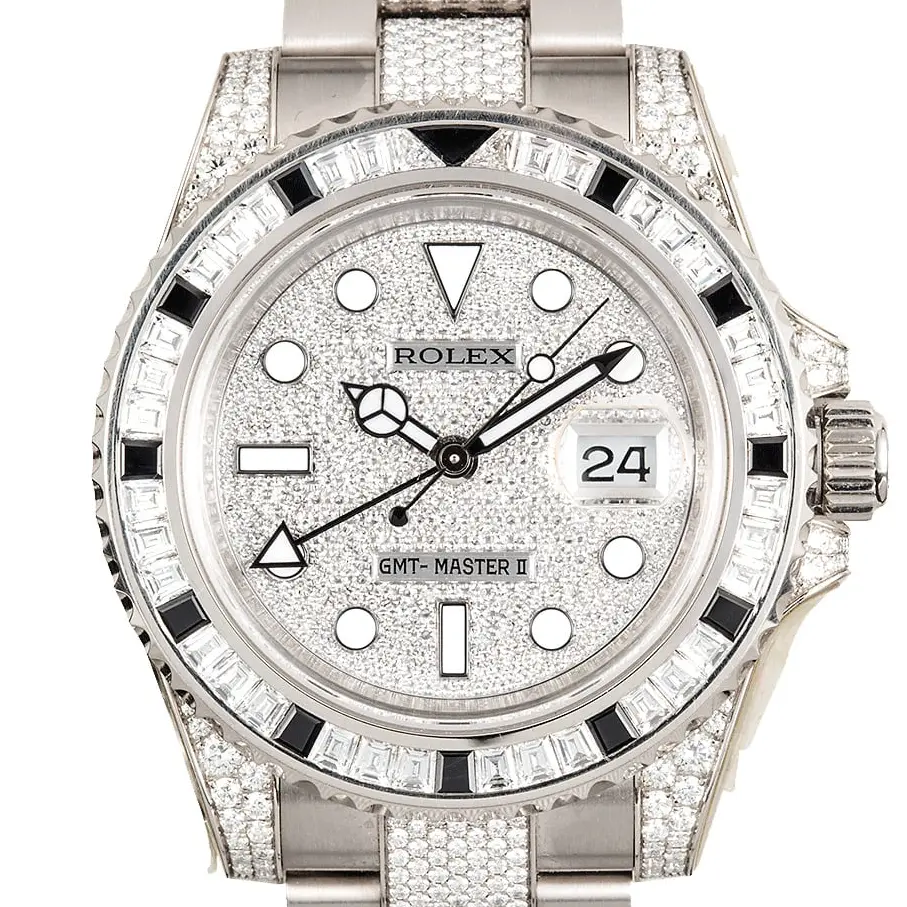 Rolex GMT-Master II 116759SANR with a pavé diamond dial, sapphire and diamond-set bezel and diamond-set white gold Oyster bracelet, a pre-owned example, studio close-up of the case