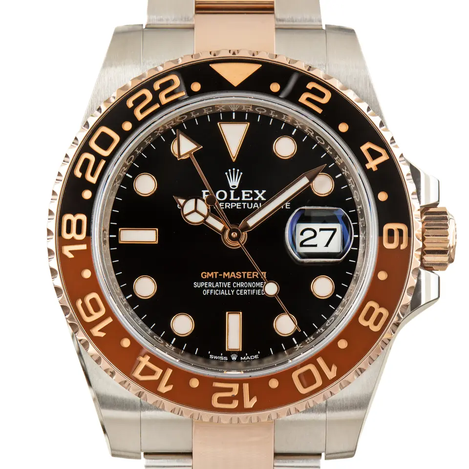 Rolex GMT-Master II 126711CHNR with a black dial and brown and black ceramic bezel, in steel and Everose gold, a pre-owned example, studio close-up of the case