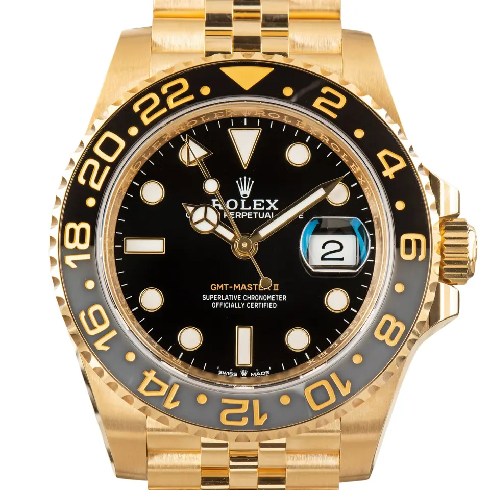 Rolex GMT-Master II 126718GRNR with a black dial and a grey and black ceramic bezel, a pre-owned example, studio close-up of the case