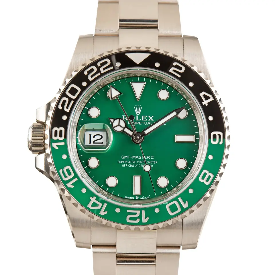 Rolex GMT-Master II 126729VTNR with a green dial, left-hand crown and a green and black ceramic bezel, a pre-owned example, studio close-up of the case