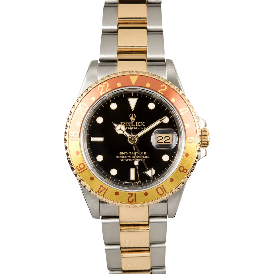 Rolex GMT-Master II 16713 with a black dial and brown and gold bezel in steel and yellow gold on an Oyster bracelet, a pre-owned example, front view of the whole watch