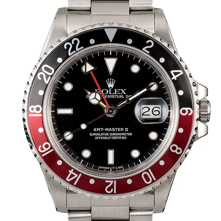 Rolex GMT-Master II 16760 with a black dial and red and black aluminium bezel insert on a steel Oyster bracelet, a pre-owned example, studio close-up of the case