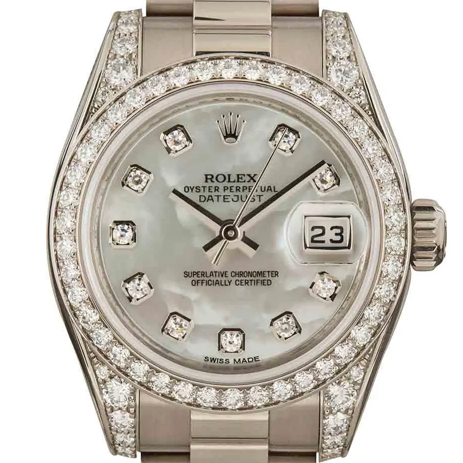 Rolex Lady-Datejust 179159 with a mother-of-pearl dial with diamond hour markers, diamond-set bezel and lugs and white gold President bracelet, a pre-owned example, studio close-up of the case