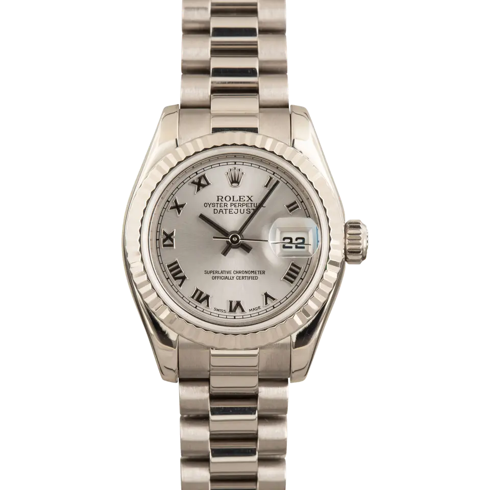 Rolex Lady-Datejust 26 179179 with a silver Roman-numeral dial, fluted white gold bezel and white gold President bracelet, a pre-owned example, front view of the whole watch