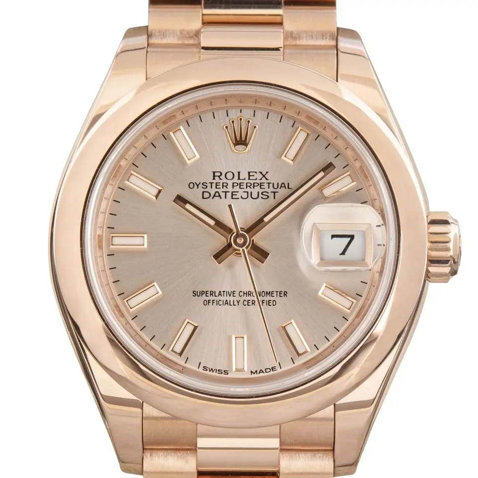 Rolex Lady-Datejust 279165 with a silver dial and smooth bezel in Everose gold on a President bracelet, a pre-owned example, studio close-up of the case