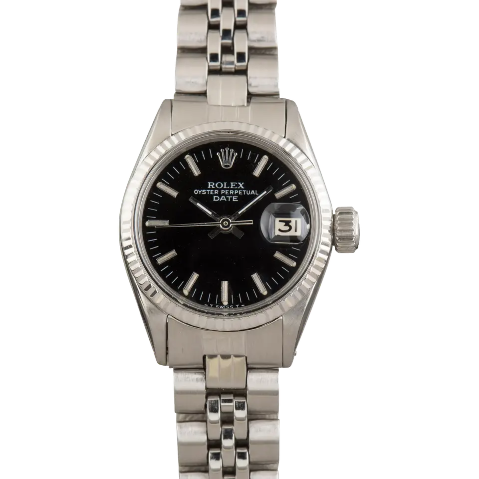Rolex Lady-Datejust 26 6517 with a black dial, fluted white gold bezel and steel Jubilee bracelet, a pre-owned example, front view of the whole watch