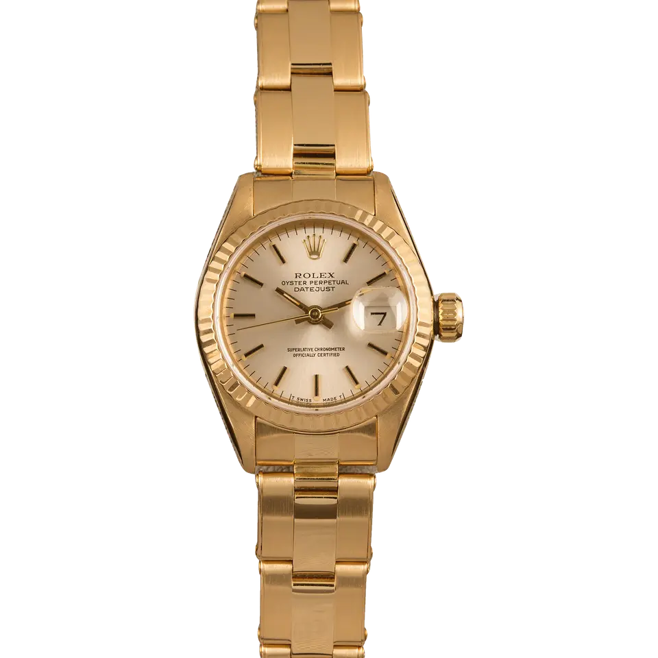Rolex Lady-Datejust 26 69138 with a silver dial, fluted yellow gold bezel and yellow gold President bracelet, a pre-owned example, front view of the whole watch