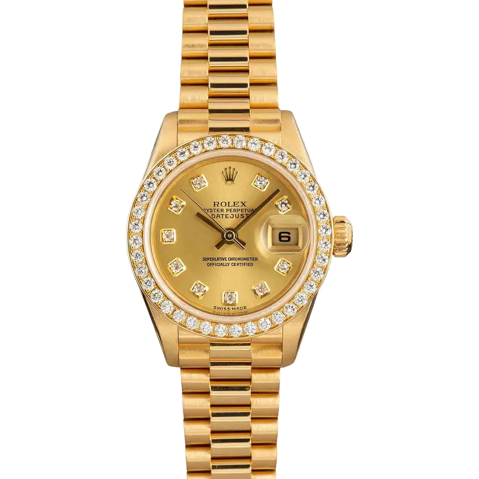 Rolex Lady-Datejust 79138 with a champagne dial with diamond hour markers, diamond-set bezel and yellow gold President bracelet, a pre-owned example, front view of the whole watch