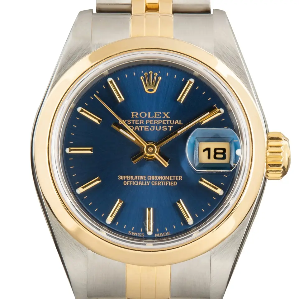 Rolex Lady-Datejust 26 79163 with a blue dial, smooth yellow gold bezel and steel and gold Jubilee bracelet, a pre-owned example, studio close-up of the case