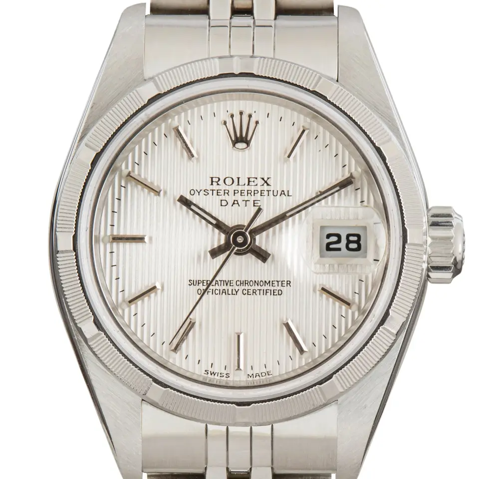Rolex Lady-Datejust 79190 with a silver dial and engine-turned steel bezel on a Jubilee bracelet, a pre-owned example, studio close-up of the case