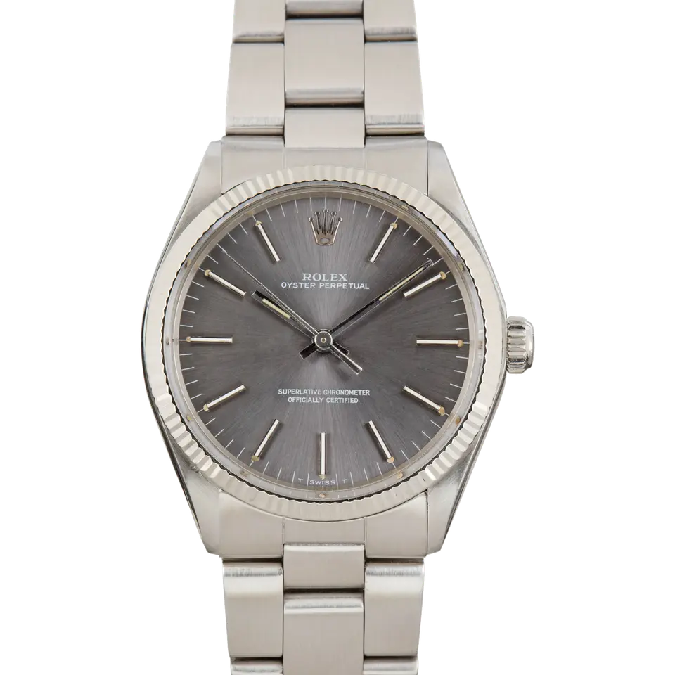 Rolex Oyster Perpetual 34 1005 with a slate dial with baton markers and a smooth steel bezel on a steel Oyster bracelet, a pre-owned example, front view of the whole watch