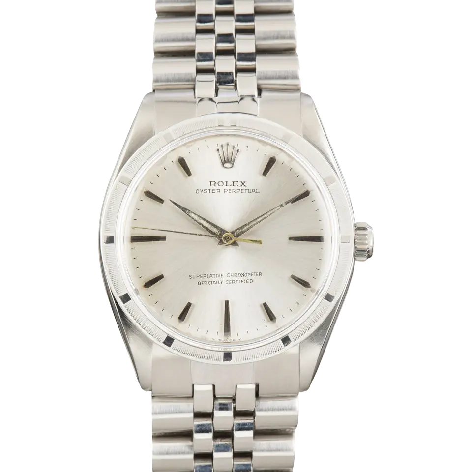 Rolex Oyster Perpetual 34 1007 with a silver dial, engine-turned steel bezel and steel Oyster bracelet, a pre-owned example, front view of the whole watch
