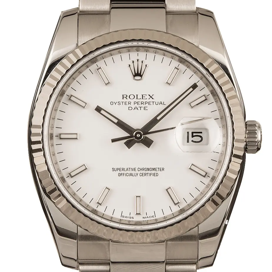 Rolex Oyster Perpetual Date 34 115234 with a white dial with date window and fluted white gold bezel on a steel Oyster bracelet, a pre-owned example, studio close-up of the case