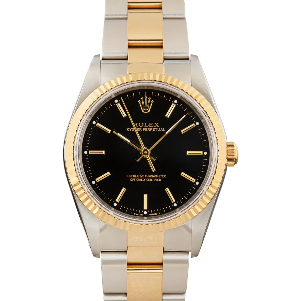 Rolex Oyster Perpetual 34 14233 with a black dial, fluted yellow gold bezel and steel and gold Oyster bracelet, a pre-owned example, front view of the whole watch