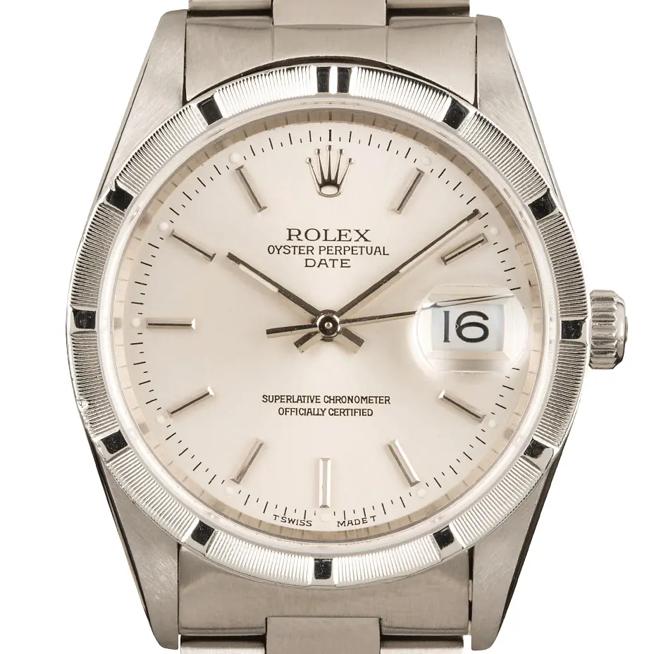 Rolex Oyster Perpetual Date 34 15010 with a silver dial with date window and engine-turned steel bezel on an Oyster bracelet, a pre-owned example, studio close-up of the case