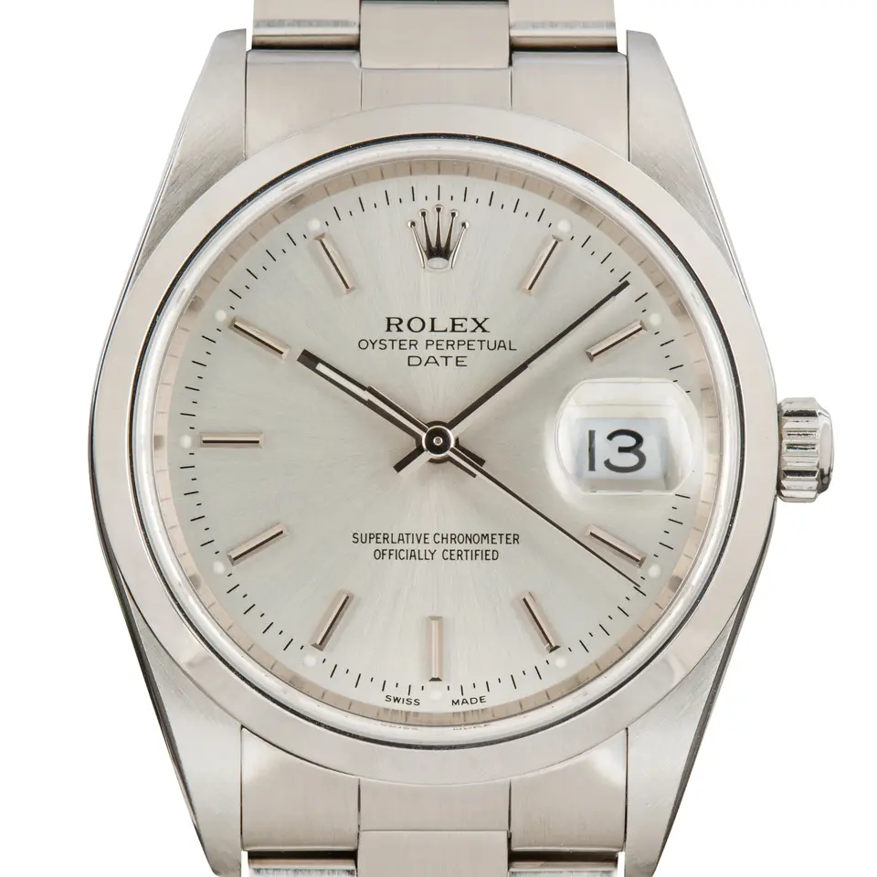 Rolex Oyster Perpetual Date 34 15200 with a silver dial with date window and smooth steel bezel on an Oyster bracelet, a pre-owned example, studio close-up of the case