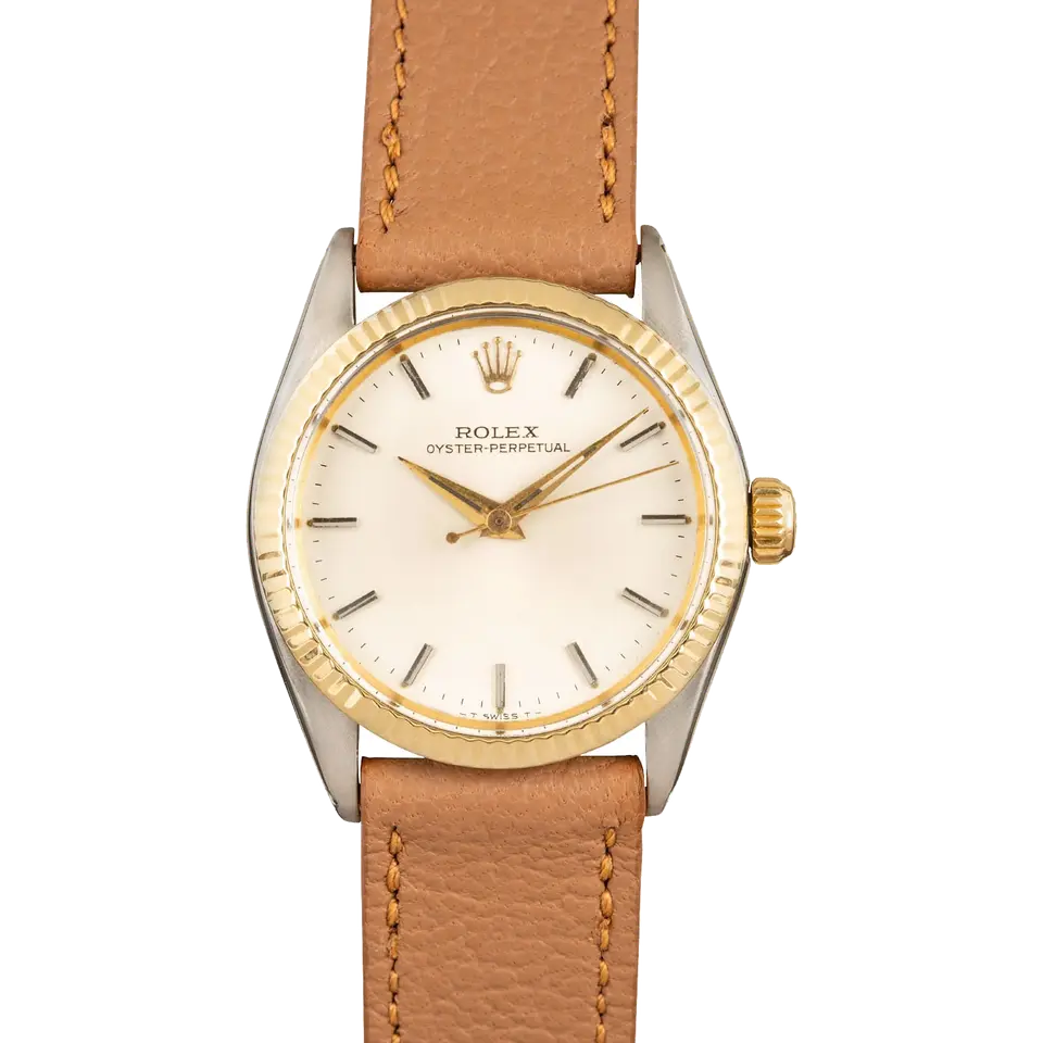 Rolex Oyster Perpetual 31 6551 with a silver dial, fluted yellow gold bezel and steel and gold case on a tan leather strap, a pre-owned example, front view of the whole watch
