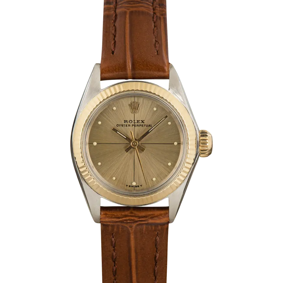 Rolex Ladies Oyster Perpetual 26 6619 with a gold sunburst dial, fluted yellow gold bezel and steel and gold case on a brown leather strap, a pre-owned example, front view of the whole watch