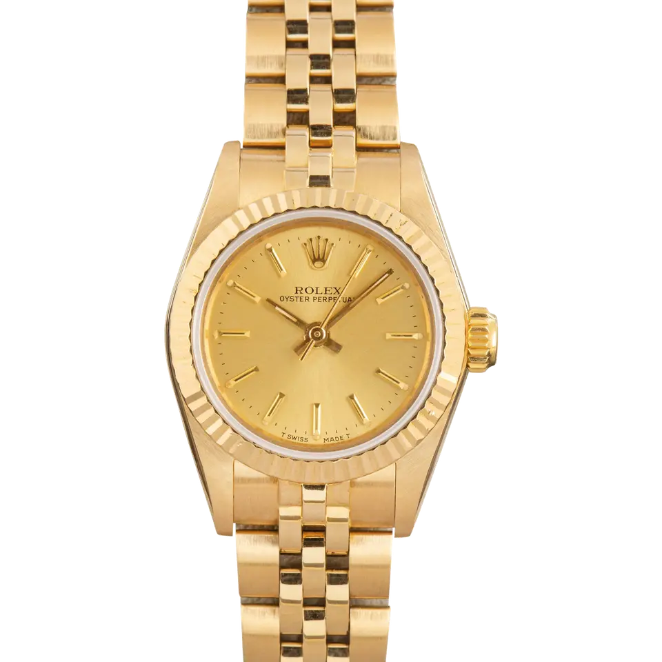 Rolex Oyster Perpetual 24 67198 with a champagne dial, fluted yellow gold bezel and yellow gold Jubilee bracelet, a pre-owned example, front view of the whole watch