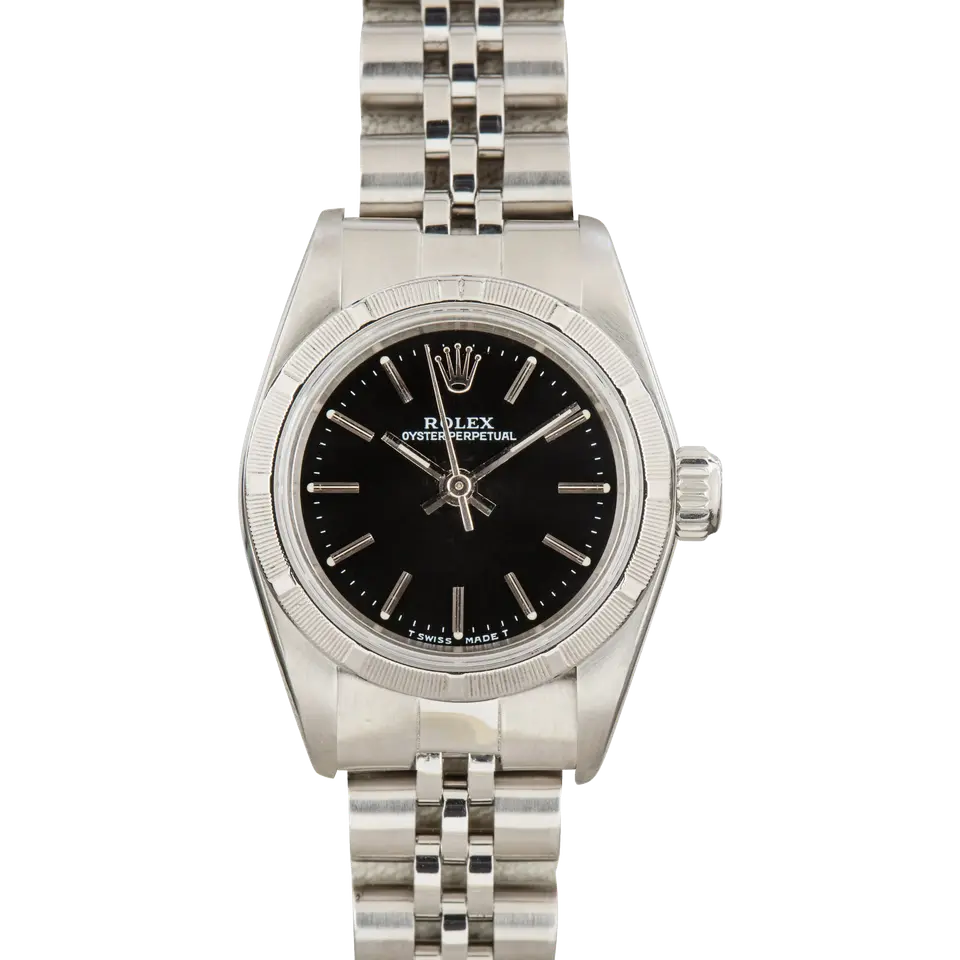 Rolex Oyster Perpetual 26 67230 with a black dial, engine-turned steel bezel and steel Oyster bracelet, a pre-owned example, front view of the whole watch