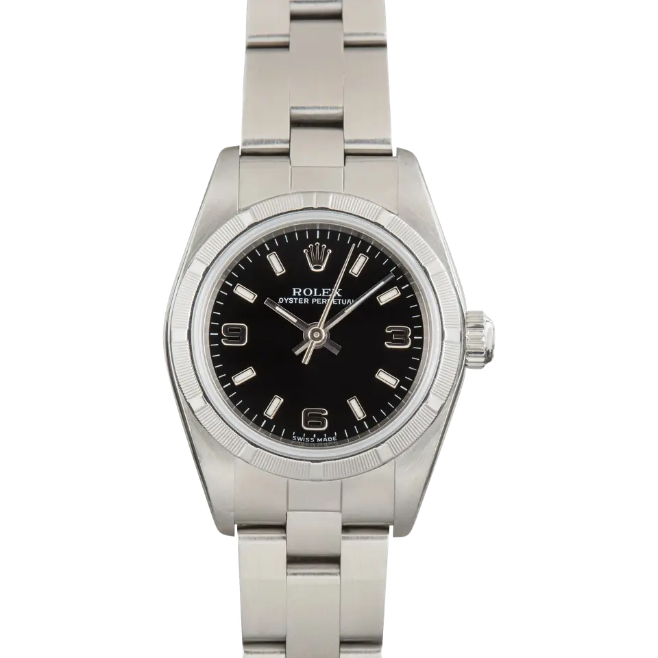 Rolex Oyster Perpetual 26 76030 with a black dial with 3, 6 and 9 numerals, engine-turned steel bezel and steel Oyster bracelet, a pre-owned example, front view of the whole watch