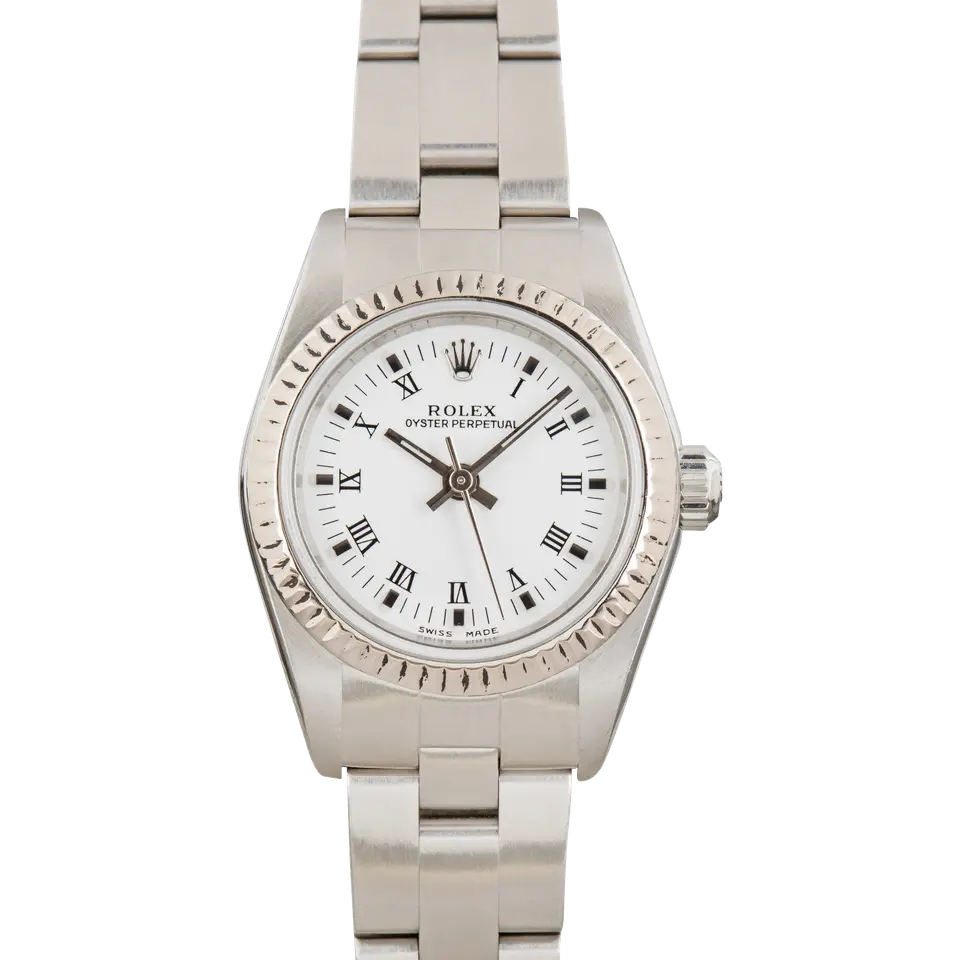 Rolex Oyster Perpetual 26 76094 with a white Roman-numeral dial, fluted white gold bezel and steel Oyster bracelet, a pre-owned example, front view of the whole watch