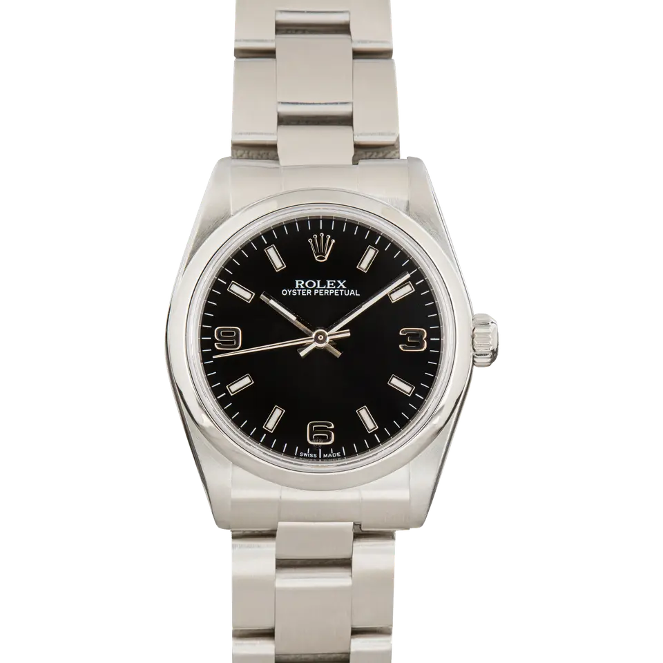 Rolex Oyster Perpetual 31 77080 with a black dial with 3, 6 and 9 numerals and smooth steel bezel on an Oyster bracelet, a pre-owned example, front view of the whole watch