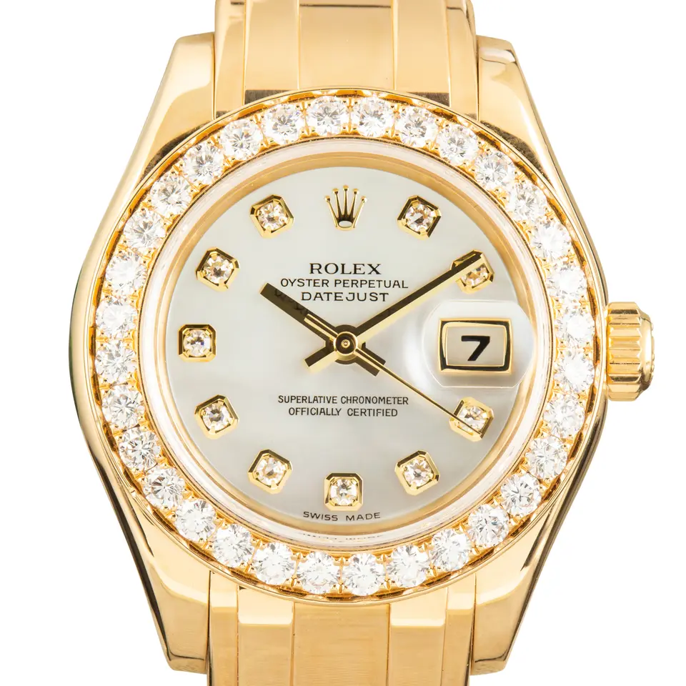 Rolex Pearlmaster 29 80298 with a mother-of-pearl dial with diamond hour markers, diamond-set bezel and yellow gold Pearlmaster bracelet, a pre-owned example, studio close-up of the case