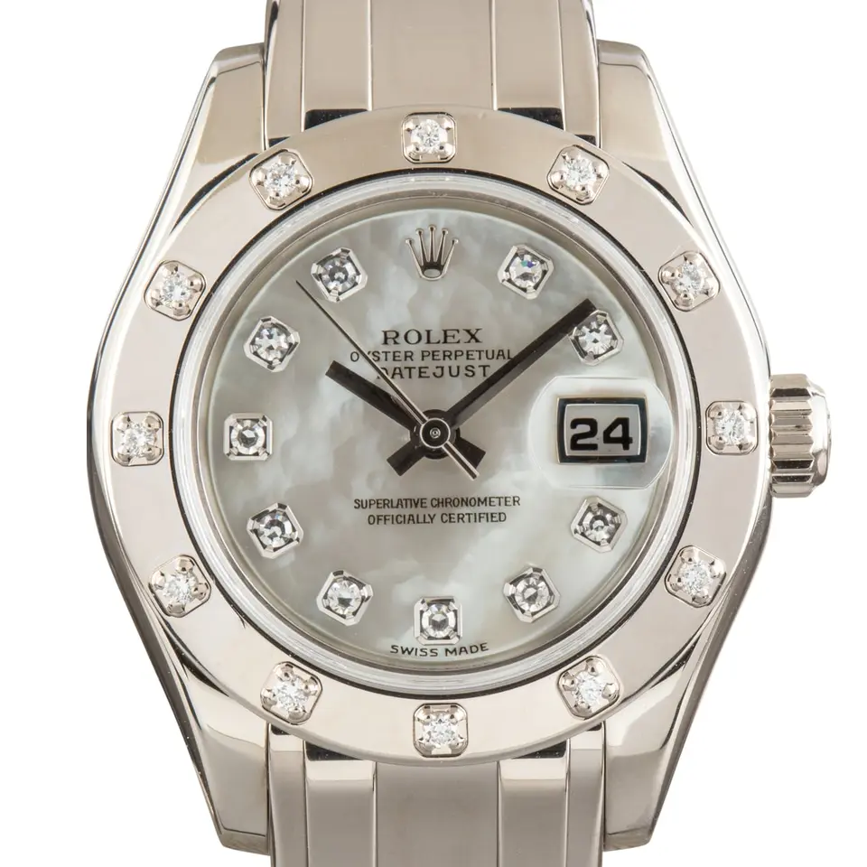 Rolex Pearlmaster 29 80319 with a grey mother-of-pearl dial with diamond hour markers, gem-set white gold bezel and white gold Pearlmaster bracelet, a pre-owned example, studio close-up of the case