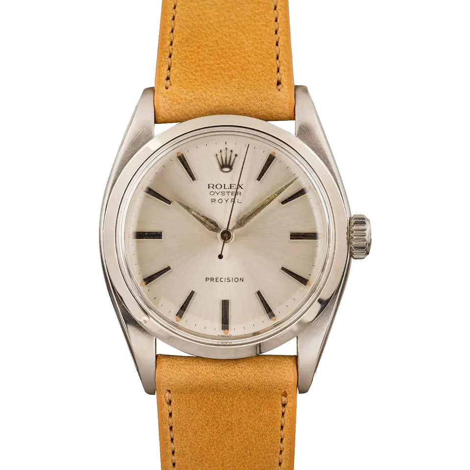 Rolex Oyster Precision 6422 with a silver Precision dial, smooth steel case on a tan leather strap, a pre-owned example, front view of the whole watch