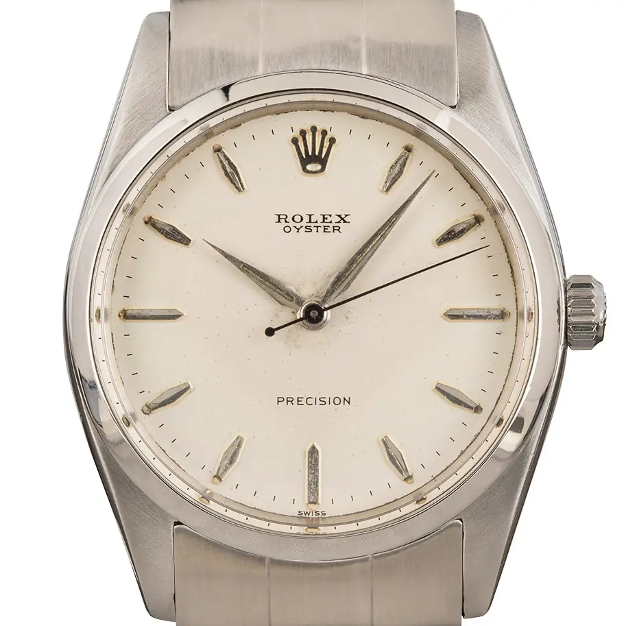 Rolex Oyster Precision 36 6424 with a silver Precision dial, smooth steel bezel and steel Oyster bracelet, a pre-owned example, studio close-up of the case