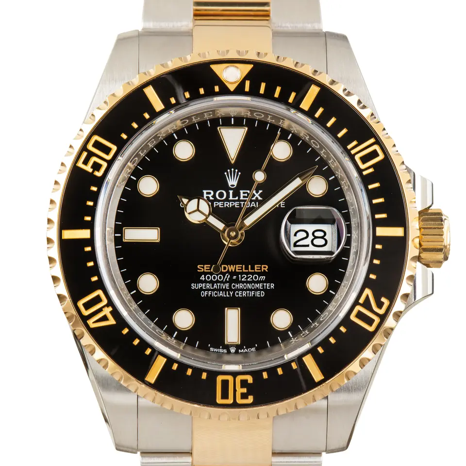 Rolex Sea-Dweller 126603 with a black dial and a black ceramic diving bezel, a pre-owned example, studio close-up of the case