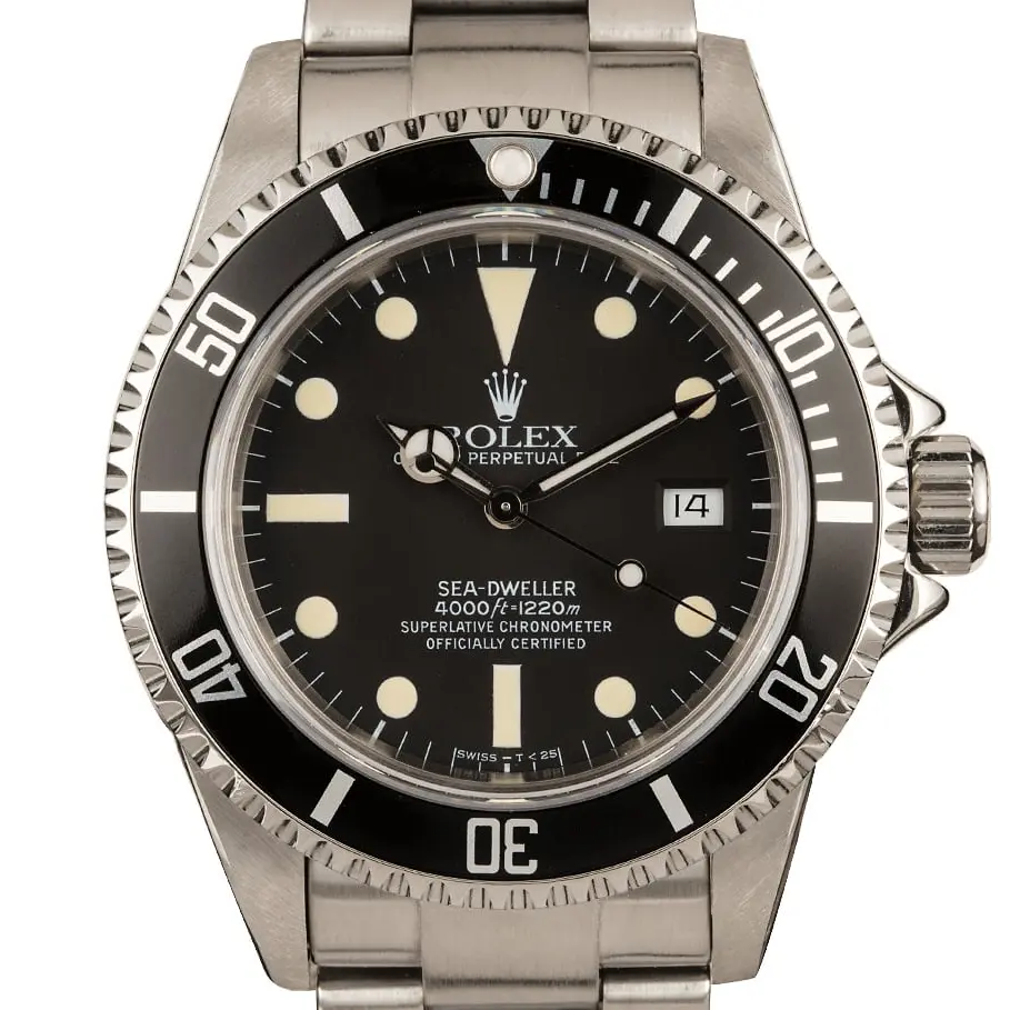 Rolex Sea-Dweller 4000 16660 with a matte black dial and black bezel insert on a steel Oyster bracelet, a pre-owned example, studio close-up of the case