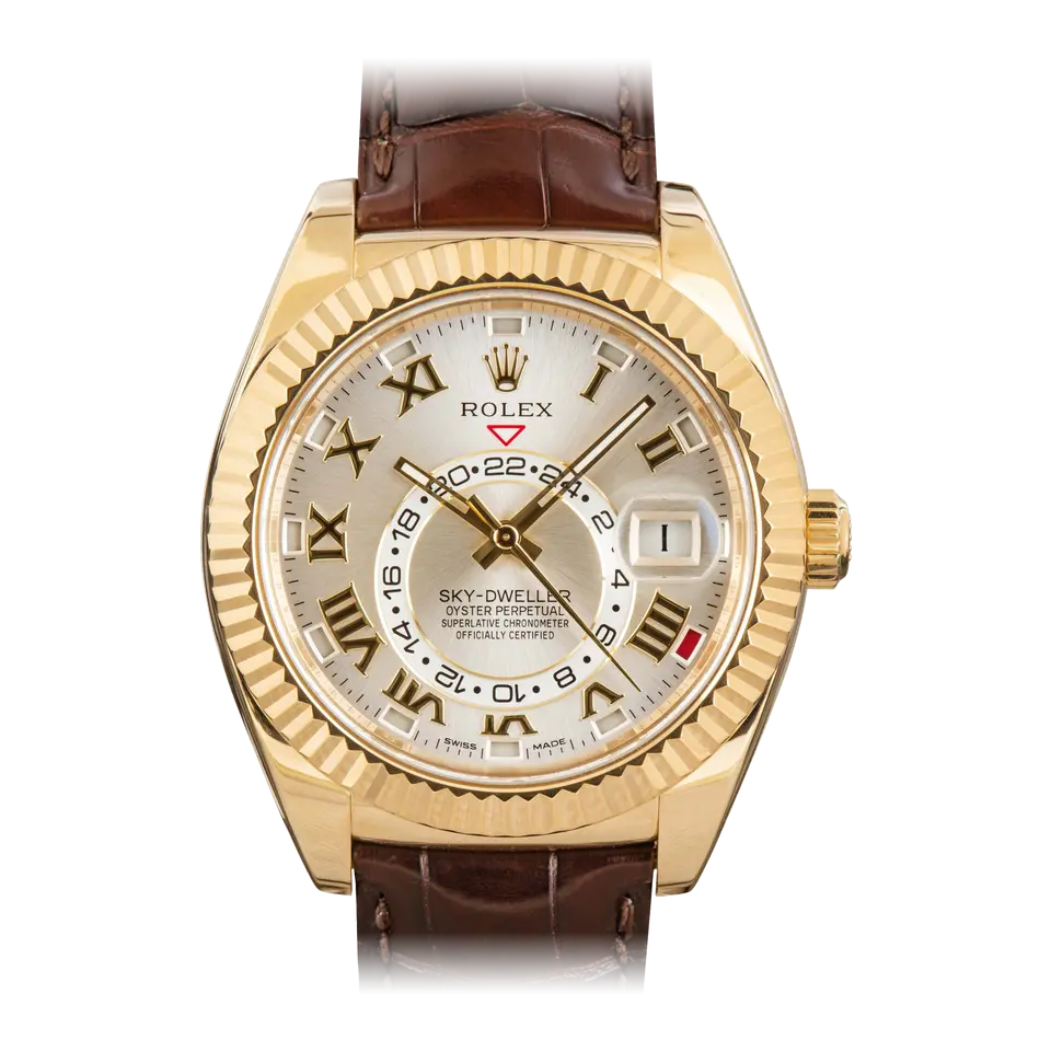 Rolex Sky-Dweller 326138 with a silver dial with Roman numerals and fluted bezel in yellow gold on a brown leather strap, a pre-owned example, front view of the whole watch