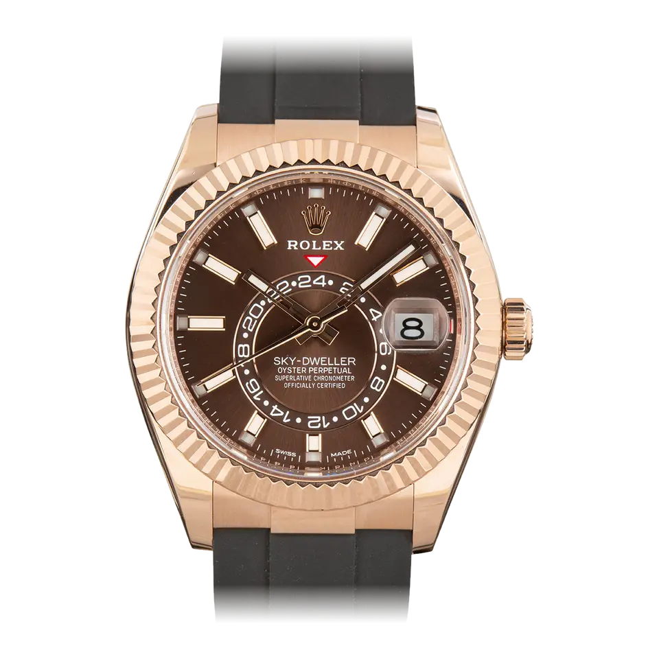 Rolex Sky-Dweller 326235 with a chocolate dial and fluted bezel in Everose gold on a black Oysterflex strap, a pre-owned example, front view of the whole watch