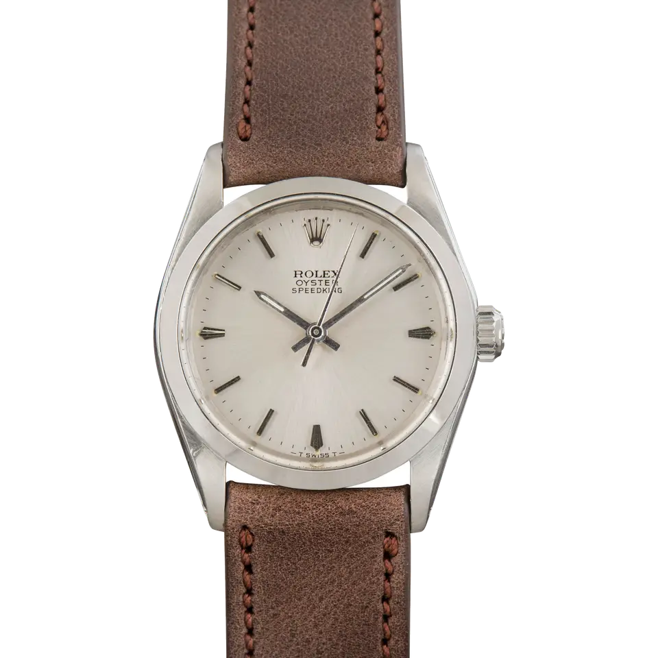 Rolex Oyster Speedking Precision 6430 with a silver dial, smooth steel case on a brown leather strap, a pre-owned example, front view of the whole watch