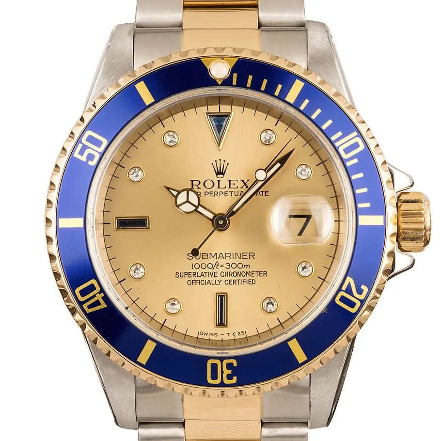 Rolex Submariner Date 16613 with a champagne dial with gem-set markers and blue bezel in steel and yellow gold on an Oyster bracelet, a pre-owned example, studio close-up of the case