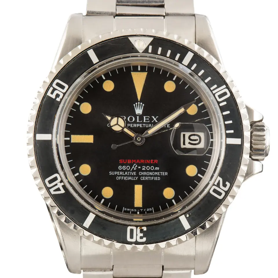 Rolex Submariner Date 1680 with a black dial with a red Submariner line and black bezel on a steel Oyster bracelet, a pre-owned example, studio close-up of the case