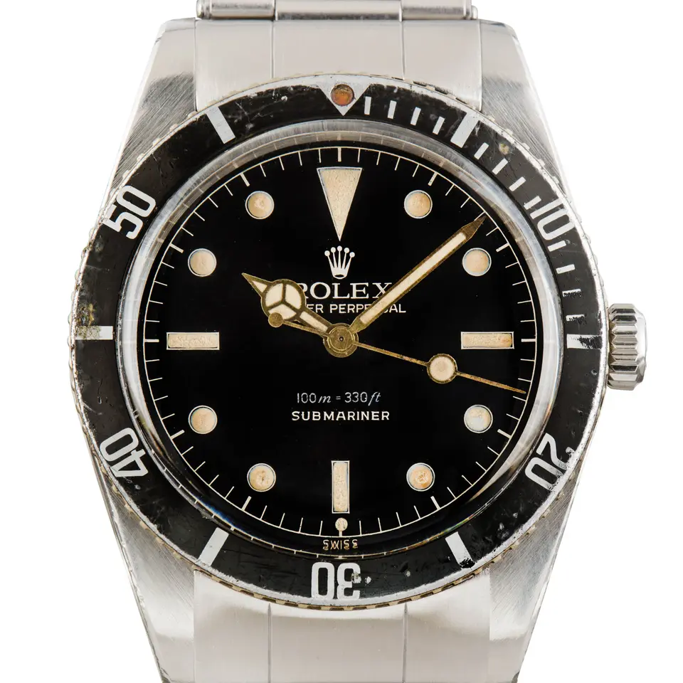 Rolex Submariner 5508 with a black dial and black bezel insert on a steel Oyster bracelet, a pre-owned example, studio close-up of the case