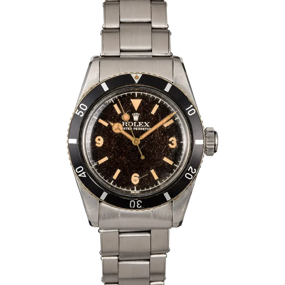 Rolex Submariner 6200 with a brown-aged (tropical) gilt dial with 3, 6 and 9 numerals and black bezel on a steel bracelet, a pre-owned example, front view of the whole watch