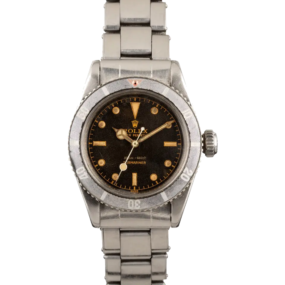 Rolex Submariner 6538 with a brown-aged (tropical) gilt dial and faded bezel insert on a steel bracelet, a pre-owned example, front view of the whole watch