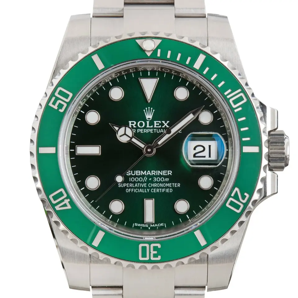 Rolex Submariner Date 116610LV (Hulk) with a green dial and green ceramic bezel on a steel Oyster bracelet, a pre-owned example, studio close-up of the case