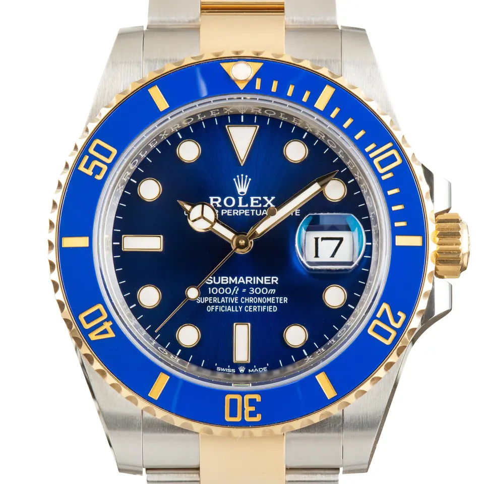 Rolex Submariner Date 126613LB with a royal blue dial and blue ceramic bezel, in steel and yellow gold, a pre-owned example, studio close-up of the case
